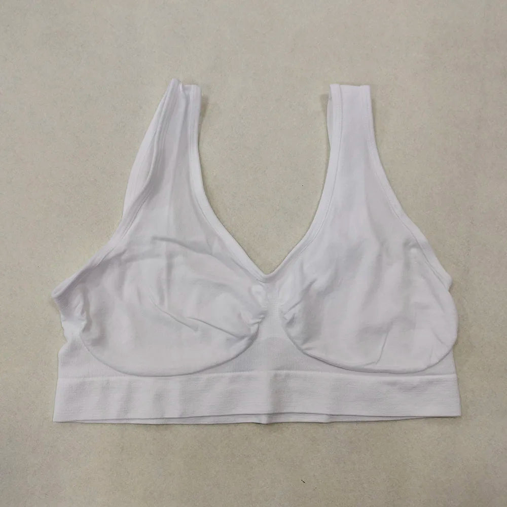 White wireless sports bra with wide band, no padding, non-adjustable straps, sleep/yoga bralette.