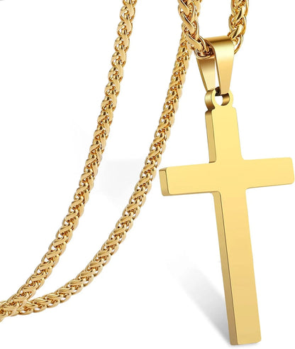 Gold-tone cross pendant on a thick Cuban-link chain necklace.
