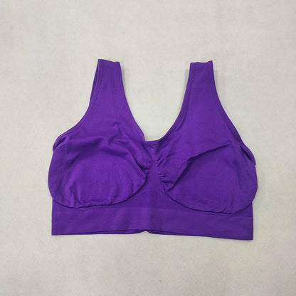 Purple wireless bralette-style sports bra with wide band, plus size, no padding, no pockets.