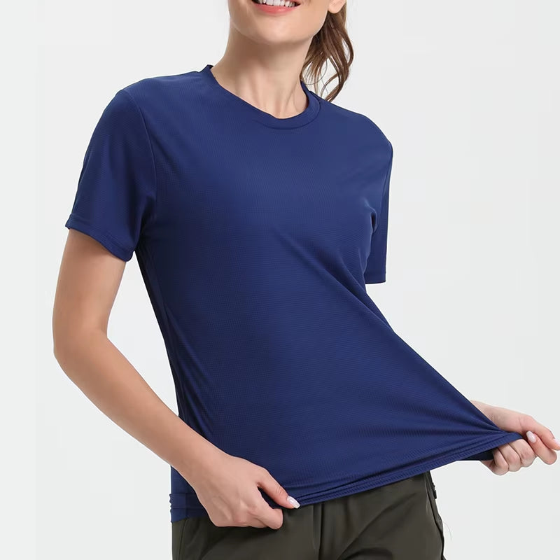 Navy ultralight quick-dry sport T-shirt on a woman; breathable, stretchy gym top.
