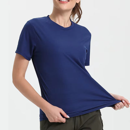 Navy ultralight quick-dry sport T-shirt on a woman; breathable, stretchy gym top.