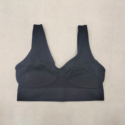 Black wireless bralette with wide underband, no padding, non-adjustable straps; ideal for sleep or yoga.